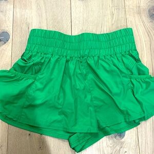 Green Free People Movement shorts with built in underwear.